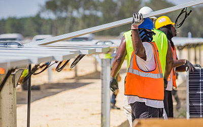 Engineers on site working together to bring a site to life.
