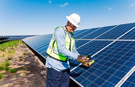 Engineer using tools to predict any chance of inefficiencies.